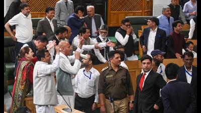 National Conference MLAs raise slogans demanding restoration of statehood during the first day of the autumn session of the assembly in Srinagar on Monday.