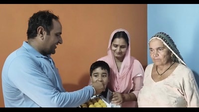 Shooter Himanshu Dhillon’s uncle, aunt and grandmother celebrating his victory, at Dahola village in Jind on Monday. (HT) Shooter Himanshu Dhillon’s uncle, aunt and grandmother celebrating his victory, at Dahola village in Jind on Monday. (HT)