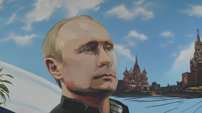 A mural depicting Russian President Vladimir Putin during Russia's parliamentary election at a polling station in Donetsk, Russian-controlled Ukraine. (AFP) A mural depicting Russian President Vladimir Putin during Russia's parliamentary election at a polling station in Donetsk, Russian-controlled Ukraine. (AFP)