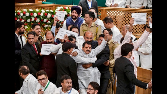 BJP legislators during their protest in J&K assembly in Srinagar on Monday. (PTI)
