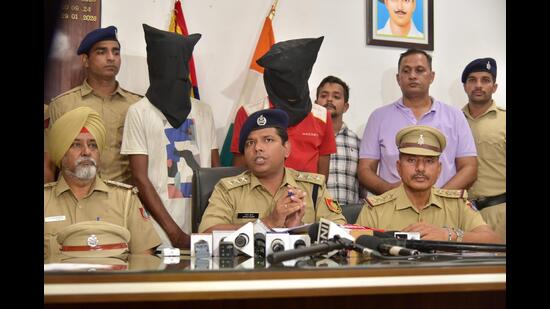 The accused in police custody in Chandigarh on Monday. (HT Photo)