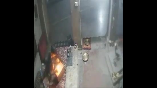 Theif check donation box by lighting matchbox before fleeing (sourced)