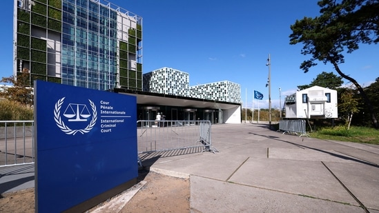 People stand outside the International Criminal Court in The Hague, Netherlands, September 22, 2025. 