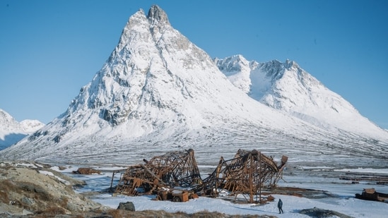 The remains of a long-abandoned U.S. military site stand in the island’s east.