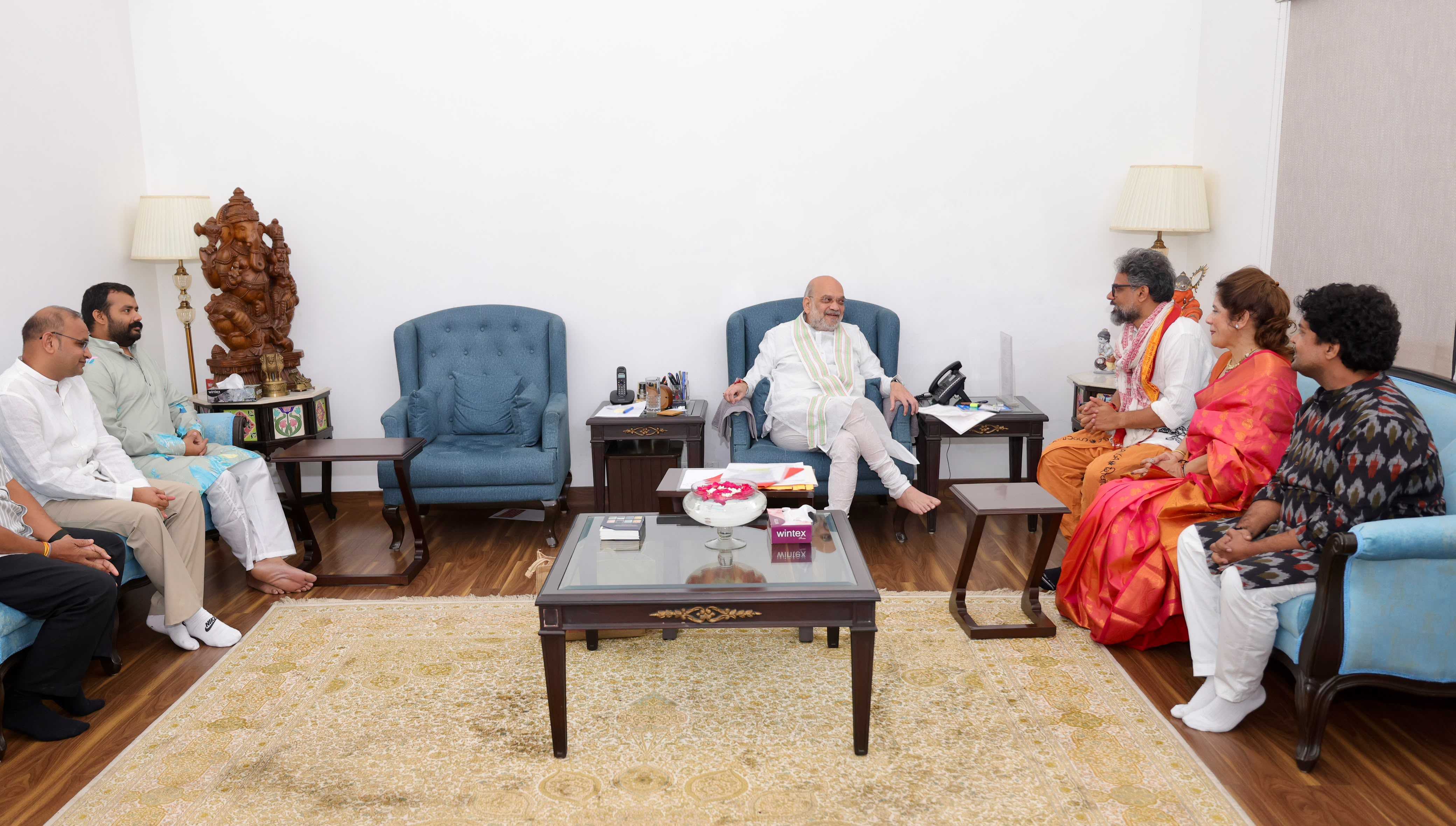 The team chats with Amit Shah. The team chats with Amit Shah.