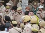 Policemen at the spot where villagers organised a protest in Sai Sardari village of the RS Pura sector in Jammu district