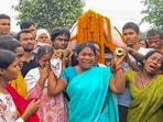 Aggrieved family members of Brijesh Ganjhu carry the latter’s mortal remains, in Chatra, Monday (PTI)