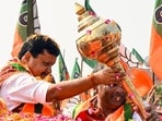 BJP national president Nitin Nabin holds a mace (Gada) as he receives a warm welcome from party workers, in Saharanpur on Tuesday. (ANI)