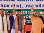 CM Yogi Adityanath, BJP national president Nitin Nabin and UP BJP chief Pankaj Chaudhary during the Shakti Kendra convenors’ conference (Western Region), in Meerut on Monday. (PTI PHOTO)