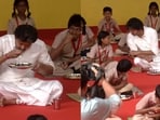 Tamil Nadu CM Vijay eats breakfast with students.