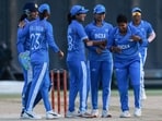 India's players celebrate a wicket in the women's gold medal cricket match between India and Sri Lanka during the 2026 Asian Games at Korogi Athletic Park India's players celebrate a wicket in the women's gold medal cricket match between India and Sri Lanka during the 2026 Asian Games at Korogi Athletic Park