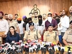 Deputy inspector general (DIG), Patiala range, Kuldeep Chahal (centre) addressing the press conference in Barnala on Tuesday. (HT Photo)