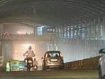 Evening haze seen at the Ashram Chowk underpass on Monday.
