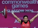 India's Mirabai Chanu celebrates after a successful lift in the women's 48 kilogram weightlifting during the Commonwealth Games in Glasgow, Scotland, Sunday, July 26, 2026. (AP Photo/Manish Swarup) (AP Photo/Manish Swarup)