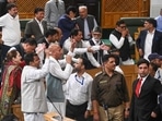 National Conference MLAs raise slogans demanding restoration of statehood during the first day of the autumn session of the assembly in Srinagar on Monday.