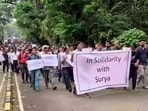 Faculty members of the Indian Institute of Technology (IIT-Bombay) hold a march in the institute's campus to support Suryanarayana Doolla, who was removed as Dean of Administrative Affairs.