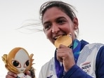 Harmanpreet Kaur poses for photographs with Gold medal after winning the Asian Games 2026. Harmanpreet Kaur poses for photographs with Gold medal after winning the Asian Games 2026.
