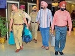 Police at the hotel room on Pakhowal Road in Ludhiana on Monday. (Gurpreet Singh/ht)