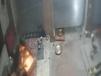 Theif check donation box by lighting matchbox before fleeing (sourced)
