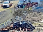 Three people died when the BMW they were driving in smashed a Coastal Road barrier and plunged into a construction site on Sunday. (Anshuman Poyrekar/HT Photo)