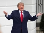 President Donald Trump speaks as he arrives to cut the ribbon on a new helipad on the South Lawn of the White House, Sept. 21, 2026, in Washington. 