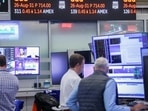 QQQ rises as AI stocks rally and Treasury yields fall. (Photographer: Michael Nagle/Bloomberg)(Bloomberg)