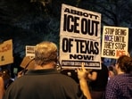 Activists hold an emergency protest a day after an Immigration and Customs Enforcement (ICE) agent shot and wounded a man from Venezuela who, according to his lawyer, was working as a DoorDash driver, at the Texas State Capitol in Austin, Texas, US, September 21, 2026. REUTERS/Nuri Vallbona(REUTERS)
