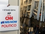 "I Stand With AP, CNN, MS NOW, and Politico" signage near the James S. Brady Press Briefing Room of the White House in Washington, DC, US.