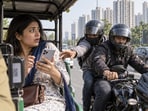 Two bike-borne thieves asked a woman about her new iPhone 18 Pro before snatching it and speeding away.