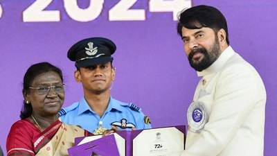 Mammootty received a standing ovation at the 72nd National Film Awards ceremony, as he went on stage to receive his Best Actor award. It is his fourth win in the category. (@PIBAhmedabad X/ANI Photo) (@PIBAhmedabad X)