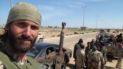 American citizen Matthew Aaron VanDyke described himself as a veteran of the Libyan revolution and a former prisoner of war. American citizen Matthew Aaron VanDyke described himself as a veteran of the Libyan revolution and a former prisoner of war.