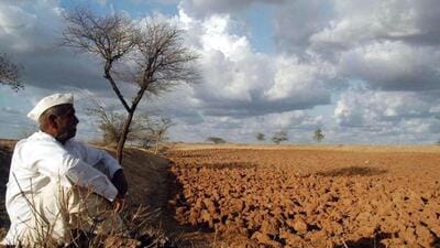Lib File B-54, MUM-120609 - JUNE 12, 2003 - SANGALI, MAHARASHTRA : A FARMER LOOKS AT THE PARCHED LAND IN DISGUST AS DROUGHT-HIT AREAS OF MAHARASHTRA CRAVE FOR RAINS IN VIEW OF MONSOON APPROACHING NEAR. PTI PHOTO PUBJUNE03 Lib File B-54, MUM-120609 - JUNE 12, 2003 - SANGALI, MAHARASHTRA : A FARMER LOOKS AT THE PARCHED LAND IN DISGUST AS DROUGHT-HIT AREAS OF MAHARASHTRA CRAVE FOR RAINS IN VIEW OF MONSOON APPROACHING NEAR. PTI PHOTO PUBJUNE03