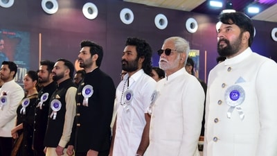 Actors Randeep Hooda, Mammootty, Sanjay Mishra, Kartik Aaryan, Dhanush, Yami Gautam Dhar and filmmaker Aditya Dhar during the 72nd National Film Awards, at Kevadia, in Narmada district, Gujarat. (@PIB_India/X via PTI Photo)(PTI09_22_2026_000384B) (@PIB_India)