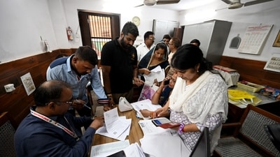 Voters arrive at a voter center to seek clarification and make correction to their SIR Forms at Laxmi Devi School Sadar Bazar, in New Delhi. (Ishant Chauhan/HT) Voters arrive at a voter center to seek clarification and make correction to their SIR Forms at Laxmi Devi School Sadar Bazar, in New Delhi. (Ishant Chauhan/HT)