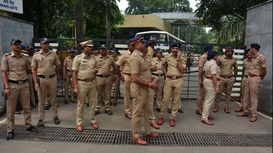 Heavy police deployment at the IIT Bombay gate on Tuesday (Praful Gangurde/HT)