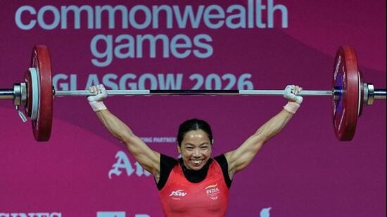 India's Mirabai Chanu celebrates after a successful lift in the women's 48 kilogram weightlifting during the Commonwealth Games in Glasgow, Scotland, Sunday, July 26, 2026. (AP Photo/Manish Swarup) (AP Photo/Manish Swarup)