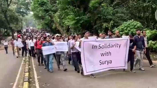 Faculty members of the Indian Institute of Technology (IIT-Bombay) hold a march in the institute's campus to support Suryanarayana Doolla, who was removed as Dean of Administrative Affairs.