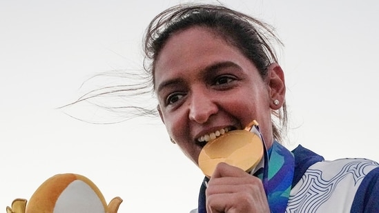 Harmanpreet Kaur poses for photographs with Gold medal after winning the Asian Games 2026.(PTI)