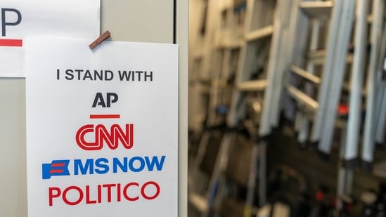 "I Stand With AP, CNN, MS NOW, and Politico" signage near the James S. Brady Press Briefing Room of the White House in Washington, DC, US.