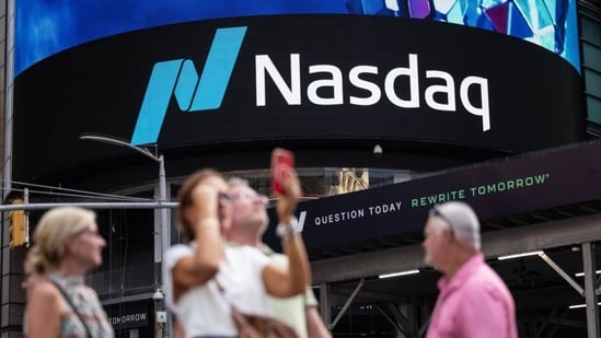 Nasdaq hits record high as oil prices fall and US-Iran talks lift market sentiment. 