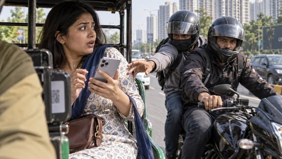 Two bike-borne thieves asked a woman about her new iPhone 18 Pro before snatching it and speeding away.