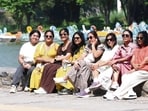 ALL WEATHER FRIENDS: A group seen enjoying the pleasant weather at Sukhna Lake, Chandigarh, on Wednesday. (Keshav Singh/HT)