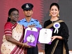 President Droupadi Murmu presents the Best Actress in a Leading Role award for Article 370 to Yami Gautam at the 72nd National Film Awards ceremony, in Kevadia on Tuesday. (@rashtrapatibhvn X/ANI Photo)
