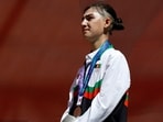 2026 Silver medallist Afghanistan's Fariba Hashimi stands on the podium during the victory ceremony