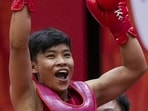 Nagoya: India’s Naorem Roshibina Devi celebrates after defeating Indonesia’s Kusumaningtyas Thani and winning a silver medal in the women’s 60kg wushu semifinal match during the 20th Asian Games, in Nagoya, Japan, Wednesday, Sept. 23, 2026. (PTI Photo/Arun Sharma) (PTI09_23_2026_000191B) (PTI)