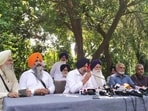 Former Enforcement Directorate (ED) deputy director Niranjan Singh (second from right) after joining the Akali Dal Waris Punjab De in Chandigarh on Wednesday.