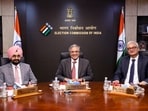 Chief Election Commissioner Gyanesh Kumar with Election Commissioners SS Sandhu and Vivek Joshi during a meeting.