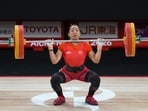 India's Mirabai Chanu competes in the women's 49kg Group A weightlifting final in Nagoya on Wednesday.
