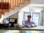 The first thing you notice about Davinder is his infectious smile. He has been working at Delhi’s India International Centre for 17 years. (HT Photo)