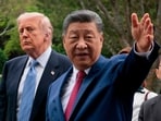 FILE - Chinese President Xi Jinping, right, gestures as he greets U.S. President Donald Trump at Zhongnanhai Garden in Beijing, China, Friday, May 15, 2026. (Evan Vucci/Pool Photo via AP, Pool)